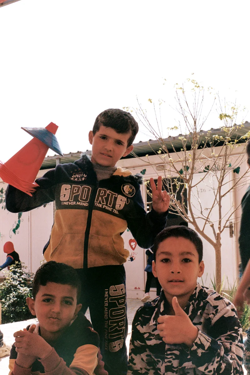 Three students at the Azraq Center in Jordan.